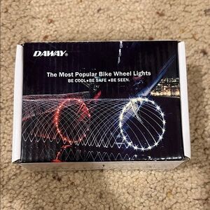 Daway LED Wheel Light Set — White Packaging with Black Logo
